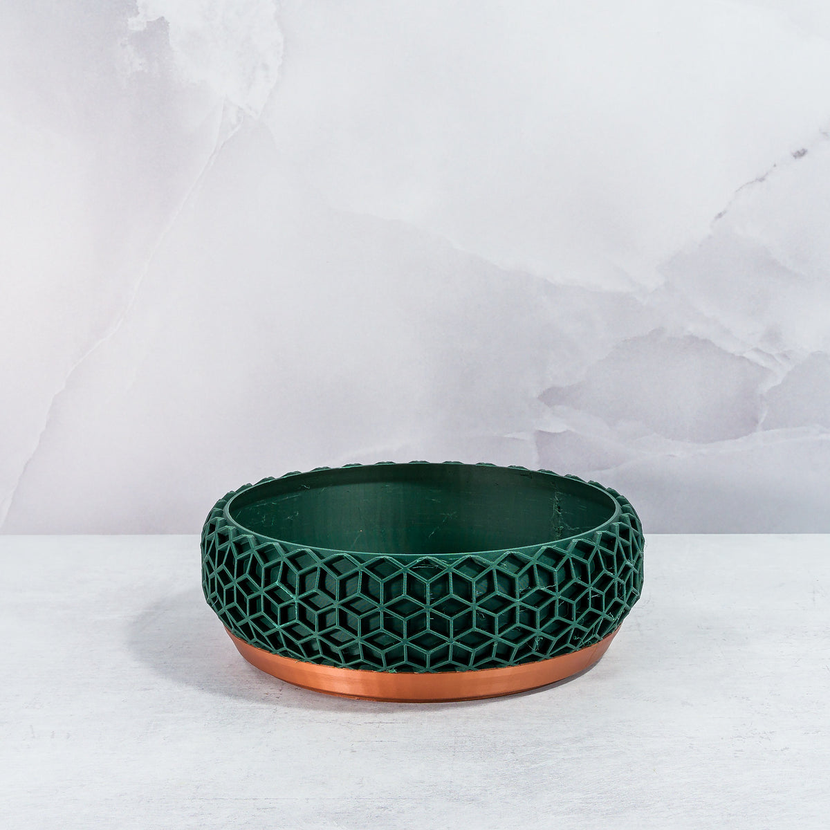 "Front-facing empty HONEYCOMB bowl planter with copper base and detailed forest pattern."
