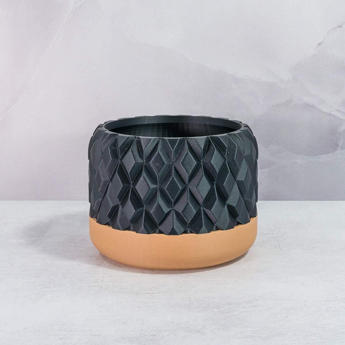 Front Facing: "GEM planter with wood base and carbon fibre pattern, front view."
