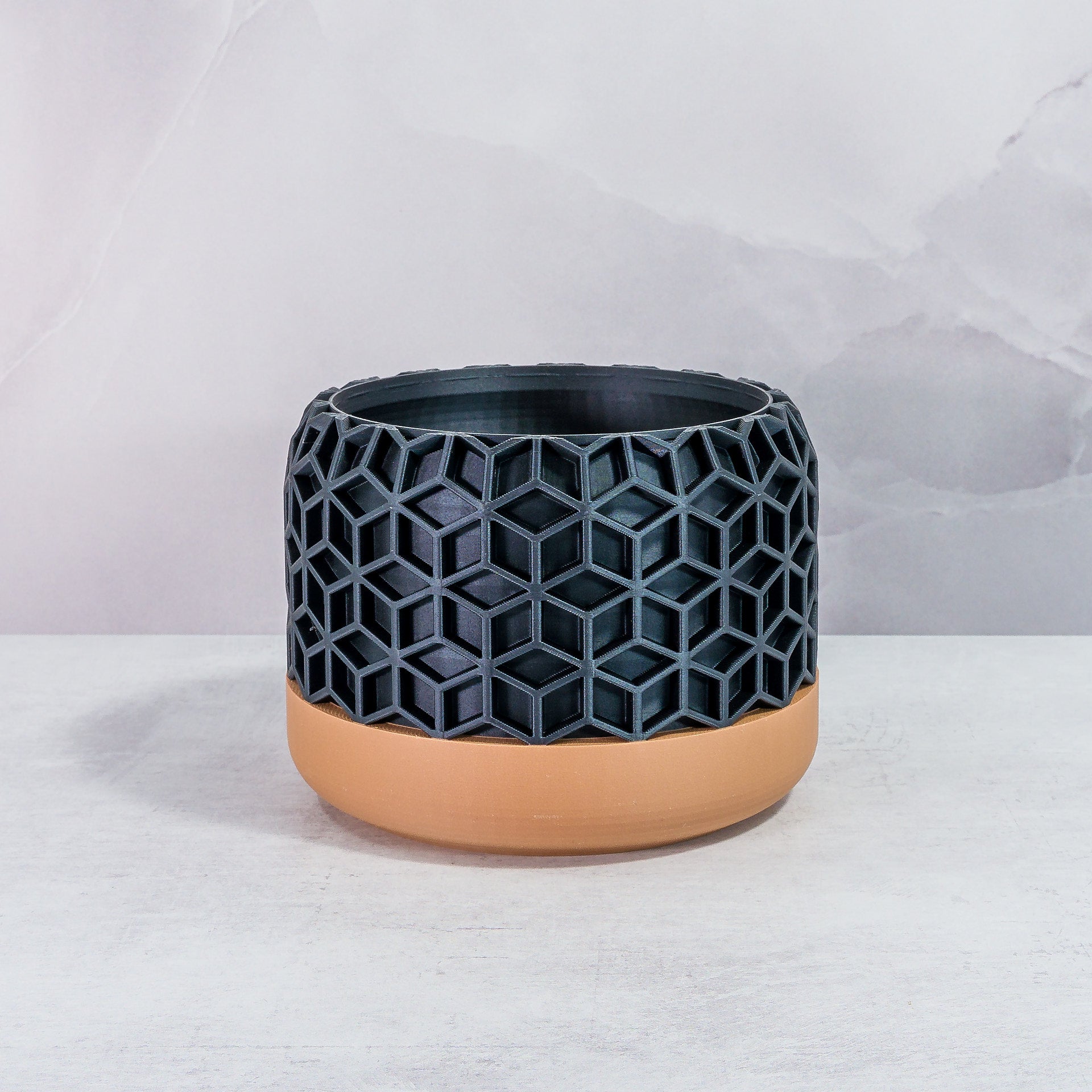 Front Facing: "HONEYCOMB planter with wood base and carbon fibre pattern, front view."
