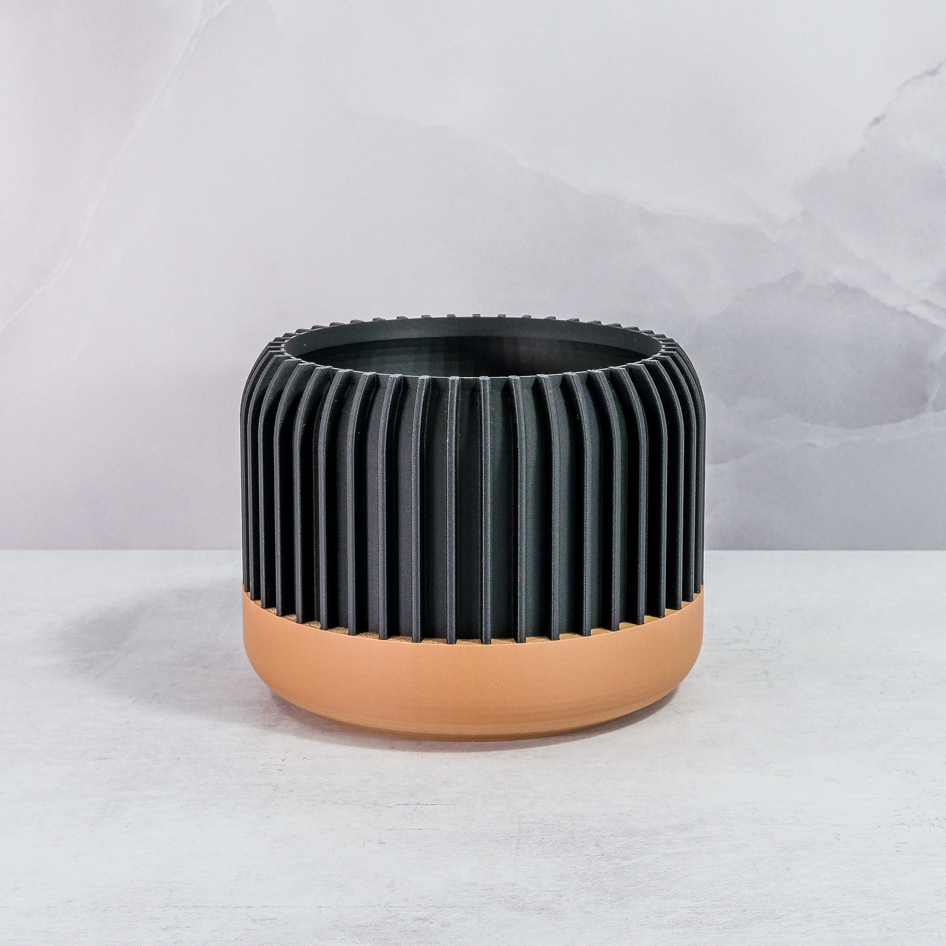 Front Facing: "LINEAR planter with wood base and carbon fibre pattern, front view."
