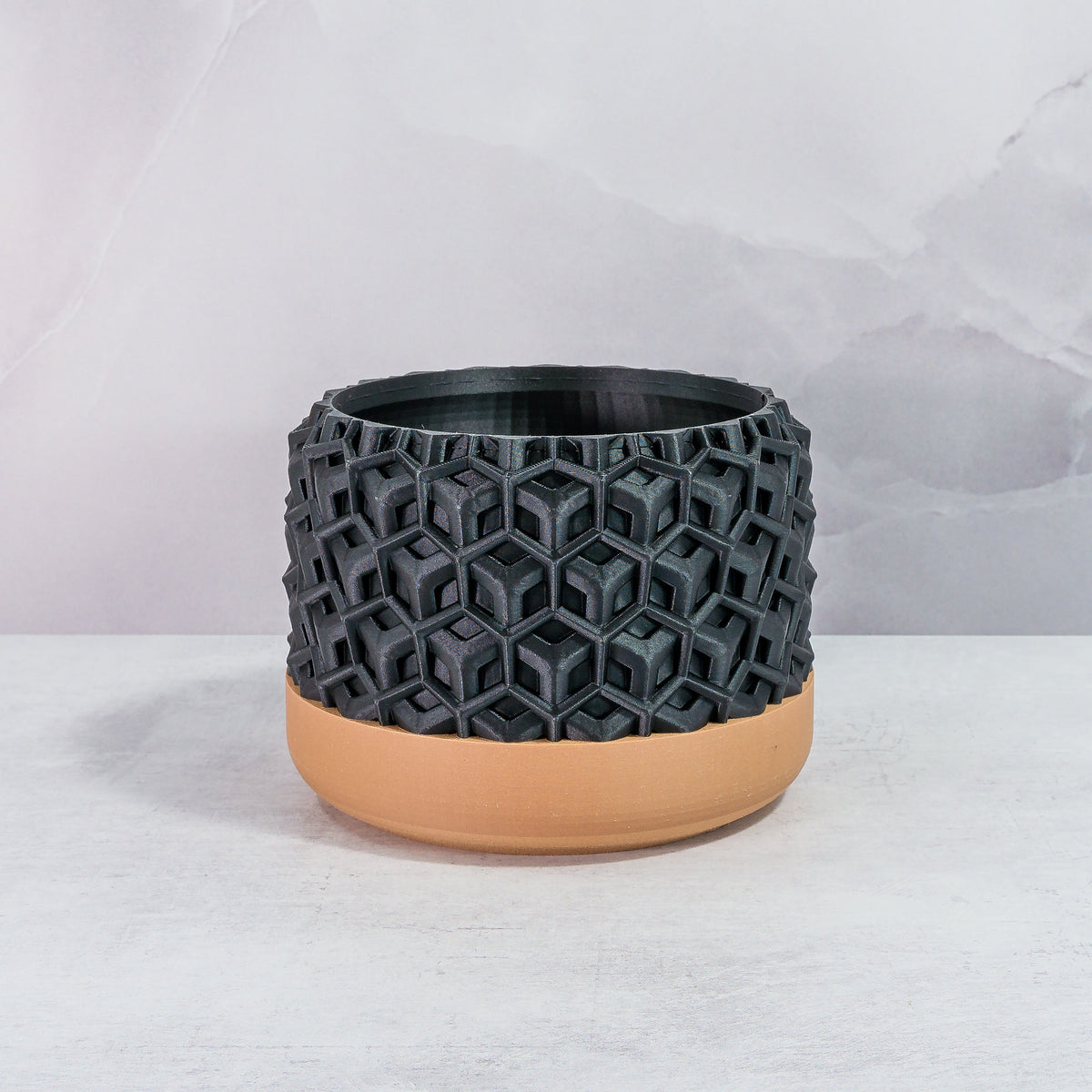 Front Facing: "TRANSFORM planter with wood base and carbon fibre pattern, front view."
